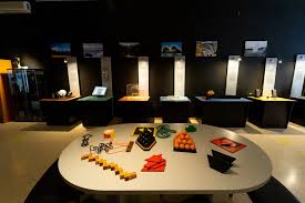 Child exploring science exhibit